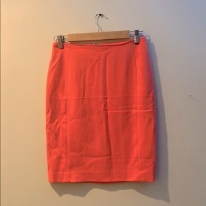 Coral pencil skirt with gold zipper